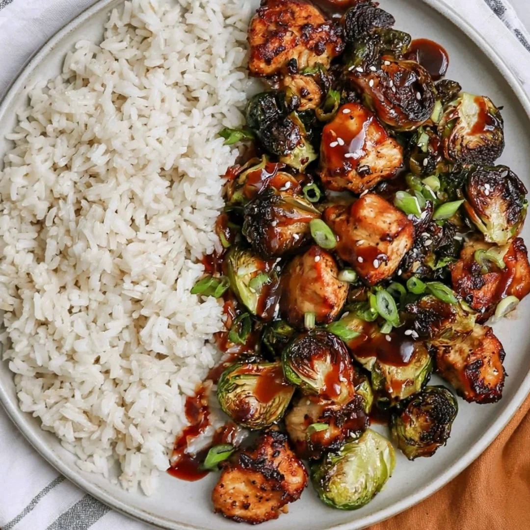 Cozy air fried chicken breast served with Brussels sprouts on a plate
